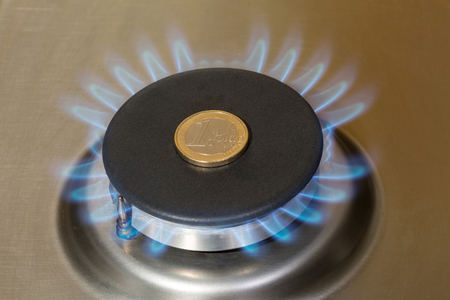 Gas stove, euro moneyの写真素材