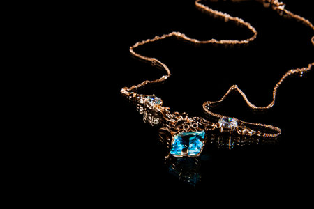 Golden necklace with topaz gemstoneの写真素材