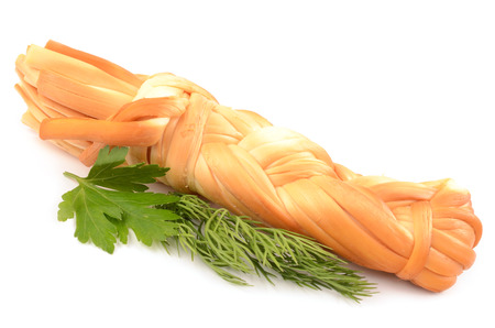 insulated braided fresh mozzarella cheese with parsley on white background