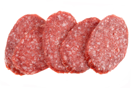 Sliced fresh salami isolated on white backgroundの写真素材