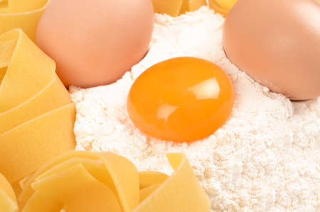 eggs and pasta closeup as backgroundの写真素材