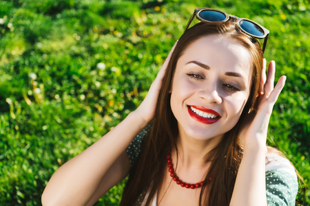 Surprised funny face woman with glasses,sunglassesの写真素材