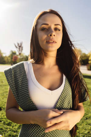 Smiling woman,freedom concept,enjoy life,summer, beautiful girl looks at the cameraの写真素材