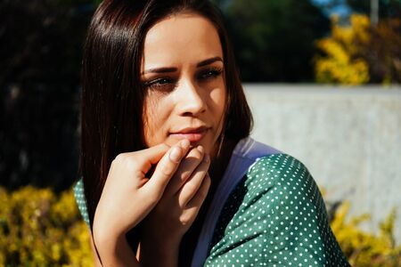 Dreaming woman in autumn  Park, thinking young girlの写真素材
