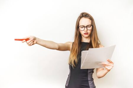 Woman shows,pointing left,isolated teacher,student. mysterious girl with long hairの写真素材