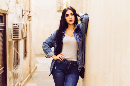 stylish young girl travels through Europe, in the city of Bakuの写真素材