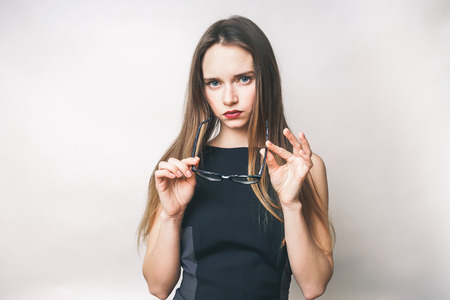 sexy young Woman in glasses on a white backgroundの写真素材