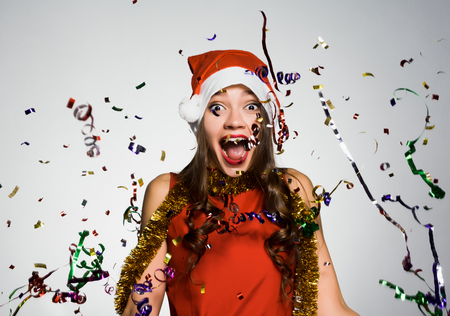 woman on a white background having fun celebrating the new yearの写真素材