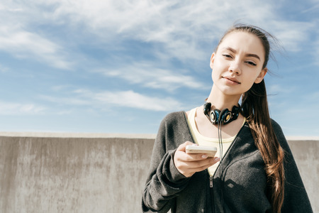 little curly baby boy sitting in the kitchen, family breakfast with momの写真素材