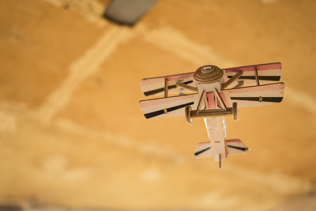 a small model of a small aircraft taken off in flightの写真素材