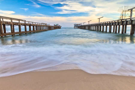 the bridge stretches out to sea in thailand.の写真素材