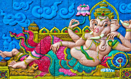 statue of ganesh on the wall.の写真素材