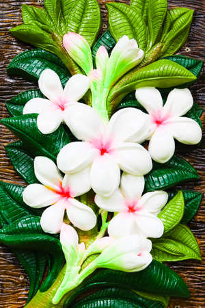 Statue of flowers on the wall.の写真素材