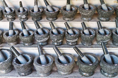 Pestle and stone mortar , Thai cooking tool.の写真素材