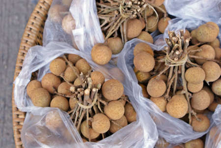 Longan in plastic bagの写真素材