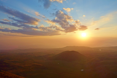 Colorful sunset from the edge of Azhdahak volcano in Geghama mountains near to lake Sevan, Armeniaの写真素材