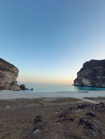 Afoul Beach view with lagoon at the end and very challenging access via canyon in dry riverbed, Salalah, Southern Oman, Middle Eastの写真素材