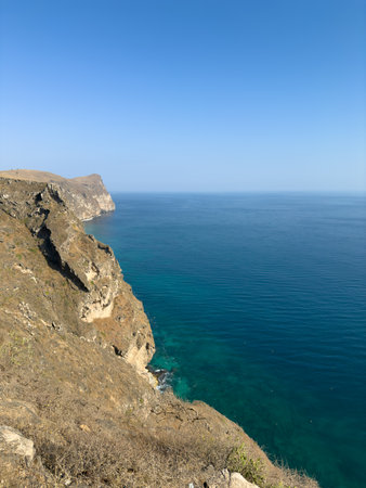Iftalqoot beach view with dramatic coast and cliffs in Salalah, Southern Oman, Middle Eastの写真素材