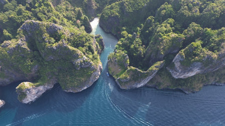 Stunning aerial footage of Wang Long Bay, a hidden limestone cove with turquoise waters in the Phi...