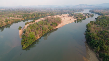 Stunning aerial views of dense rainforest, mountains, and remote landscapes in Virachey National...