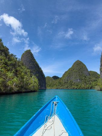 Remote lagoon at Wayag island consisting of limestone islands, Raja Ampat, West Papua, Indonesia