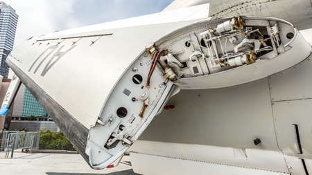 Folding large, white wing, close-up, military aircraftの写真素材