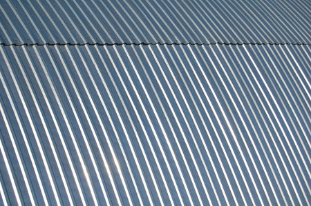 Iron edges: the fragment wall and roof of flat storageの写真素材