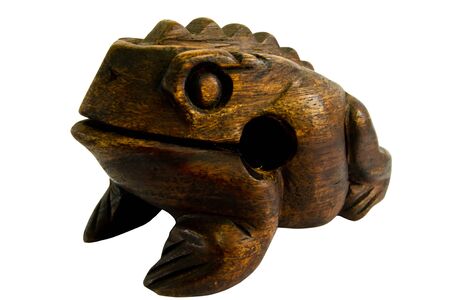 Wooden frog carving on white background の写真素材