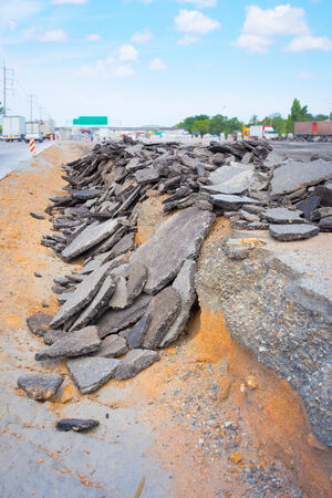 Demolish asphalt road for new construction.の写真素材