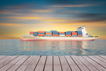 Cargo ship and cargo container in sea with sky background.の写真素材