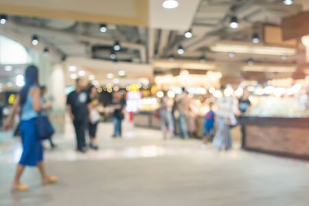 Defocus of shoppers and shopping mall for shopping business concept background.の写真素材