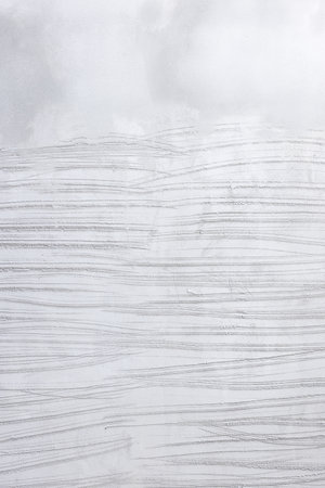 Concrete wall plastering in vertical. Texture pattern of cement mix, sand for building construction....