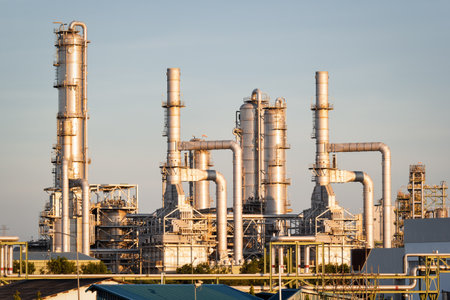 Petrol chemical plant in Map Ta Phut sub district, Rayong province of Thailand at evening sky. Large...