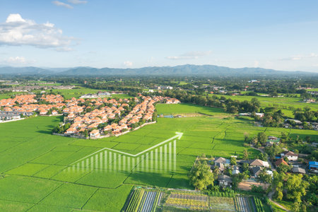 Land value in aerial view consist of landscape of green field or agriculture farm, house building,...