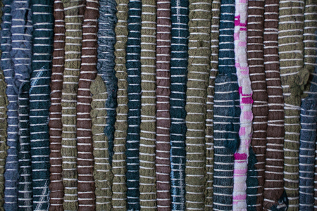 Colorful carpet texture. Background of andalusian carpet. Jarapa. Handmade carpet. Close up of beautiful hand made carpet. Multicolored abstract texture and background for designers.の写真素材