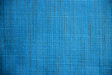 Blue fabric texture. Blue cloth background. Close up view of blue fabric texture and background. Abstract background and texture for designers.の写真素材