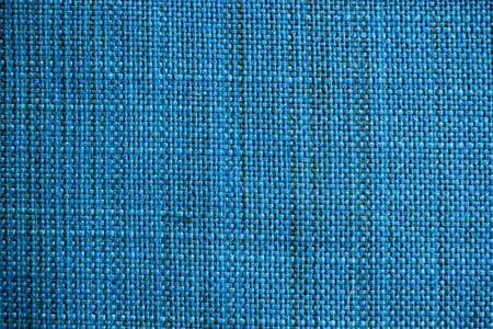 Blue fabric texture. Blue cloth background. Close up view of blue fabric texture and background....