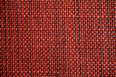 Red and orange fabric texture. Red and orange cloth background. Close up view of multicolored fabric texture and background. Abstract background and texture for designers. Cloth and Fabric texture.の写真素材