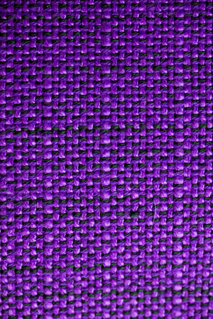 Purple fabric texture. Purple cloth background. Close up view of purple fabric texture and background. Abstract background and texture for designers.の写真素材