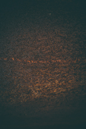 Rusted metal background in vintage style. Vintage metal texture. Abstract metal texture and background for designers. Old rusted metallic door. Close up view of corroded and rusted metal.の写真素材