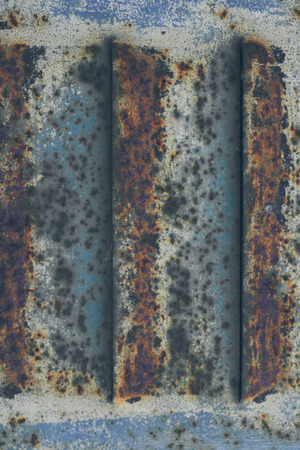 Blue rusted door texture. Blue old metal closeup. Rusty metal background & texture. Abstract texture...