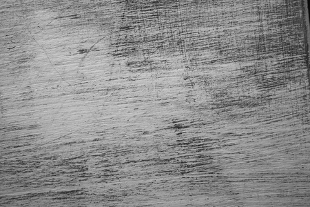 Rough texture of handmade table. Scratched vintage wood. Old vintage wood background. Closeup view of painted table and background for designers. Abstract texture and background.の写真素材