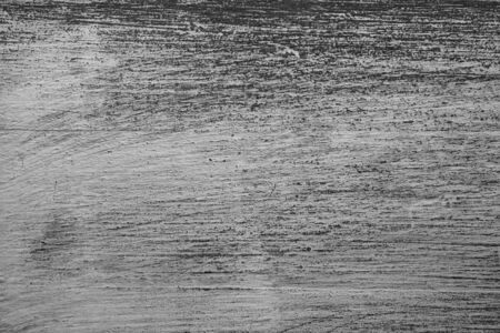 Rough texture of handmade table. Scratched vintage wood. Old vintage wood background. Closeup view of painted table and background for designers. Abstract texture and background.の写真素材