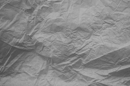 Rough white paper texture. Crumpled paper texture and background. Close up view of wrinkled white texture made with paper. Abstract texture and background for designers.の写真素材