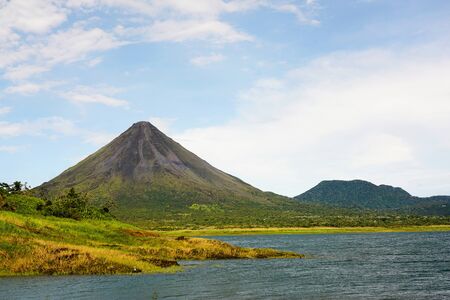 Arenal volcano view from lakeの写真素材