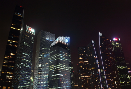 Singapore - October 12th of 2015: Some of the 49 skyscrapers over 140 metres high that can be found in the city are in Marina Bay. The 3,5km waterfront promenade  cost 35 million when built in 2008.のeditorial素材