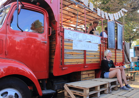 Ciutadella Gardens, Barcelona - September 20th of 2014: Food sellers deliver worldwide meals in their vintage caravans. This curious activity takes place during "La Merc" Barcelona's festival.のeditorial素材