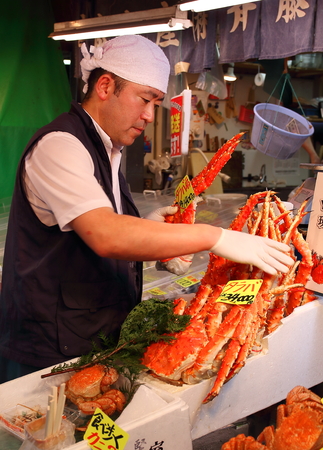 Tokyo, Japan - August, 3rd of 2017: Thousands of fish stores surround the Tsukiji Market, the biggest wholesale fish and seafood market in the world, placed in current location since 01/09/1923.のeditorial素材