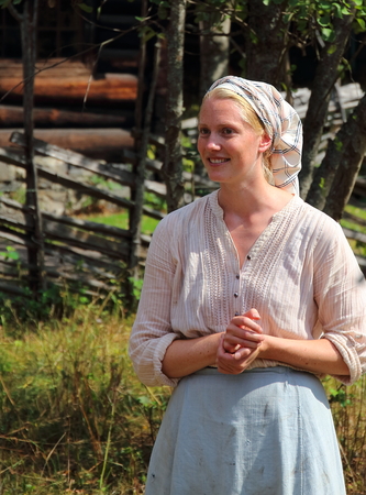 Bygdoy Peninsula, Oslo, Norway - July, 31st of 2018: Local young citizens perform historical crafts in the Norwegian Museum of Cultural History (Norsk Folkemuseum) which was established in 1894.のeditorial素材