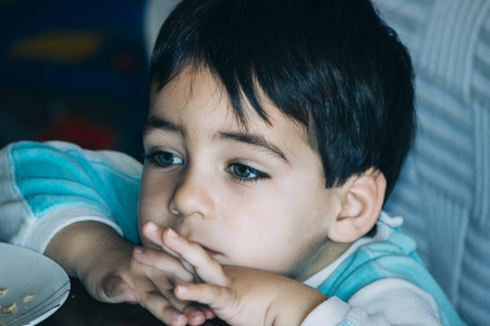 Boy with green eyesの写真素材